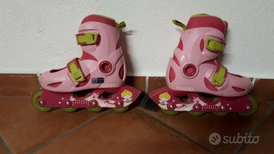 Roller Oxelo rosa con casco e protezioni