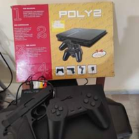 Consolle videogiochi vintage con pistola e 2 joypa