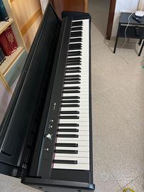 Pianoforte digitale con tasti pesati