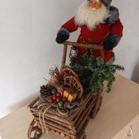 Babbo Natale con carretto porta doni