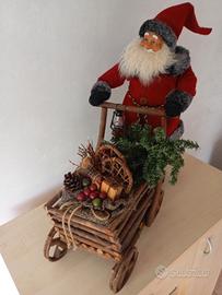 Babbo Natale con carretto porta doni