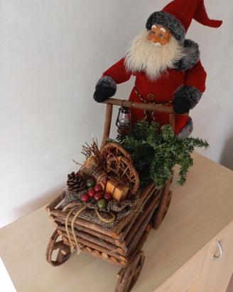 Babbo Natale con carretto porta doni