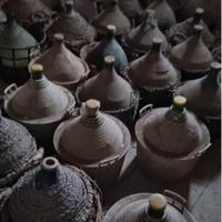 Antiche damigiane in vetro soffiato in vimjni