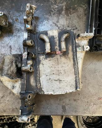 Connettore aspirazione con scambiatore di calore