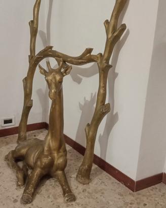 giraffa con tronco  d'albero