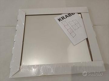 Specchio in quattro pezzi da disporre come vuoi