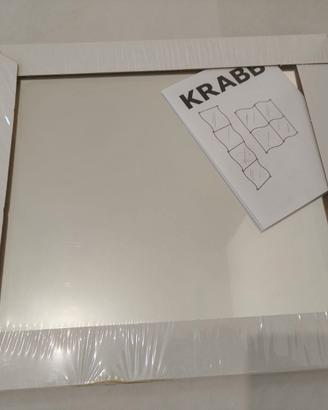 Specchio in quattro pezzi da disporre come vuoi