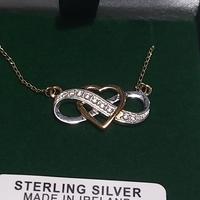Collana con pendente infinito argento e oro 10 K