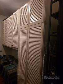 armadio con letto scomparso e lavatrice