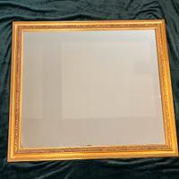SPECCHIO CON CORNICE IN ORO ANTICHIZZATO
