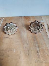 coppia di angioletti in argento.