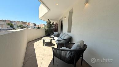 Elegante trilocale con finiture esclusive