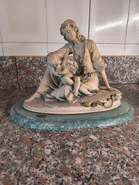 statua donna con bambino MUSTO