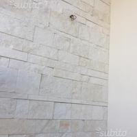 Lastre di pietra bianco puro