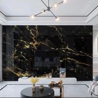 Carta da parati effetto marmo nero a venature oro