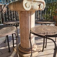 tavolo da esterno in cristallo e sedie