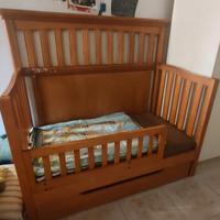 lettino in legno con sponde e cassetto