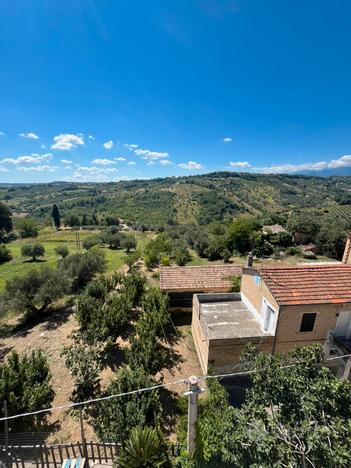 Terreno edificabile con casolare e rimessa