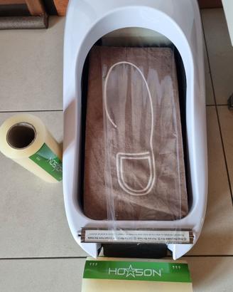 Dispenser copri scarpe monouso