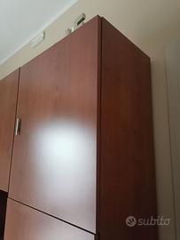 Parete attrezzata ciliegio. Come nuova.