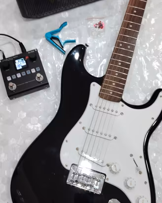 chitarra elettrica+ multi effetti+cassa BT 