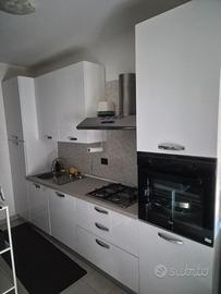 Cucina, camera da letto e cameretta