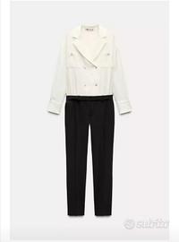 Tuta combinata.  bianco/nero