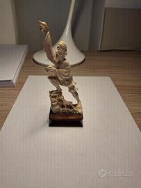 statuetta pescatore