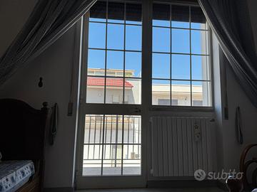 Due porte a finestra balcone