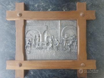 Bassorilievo in peltro su cornice legno