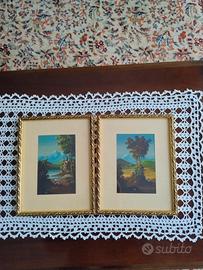 Coppia quadretti con cornice in legno lavorata 