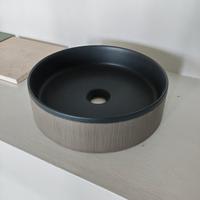 lavabo ceramica nero opaco con finitura cemento 
