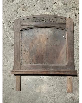 Antiche testate in legno decorato