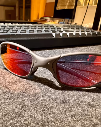 Oakley Juliet X-Metal con ruby red lenses