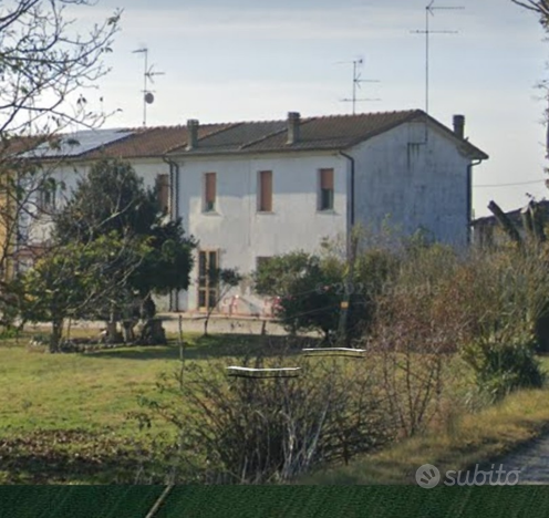 Terreno agricolo più porzione di casa e magazzino