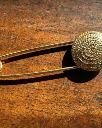 Spillone vintage in metallo dorato