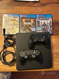 PS4 SLIM CON 2 CONTROLLER E 3 GIOCHI