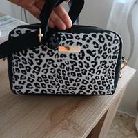 Borsa fondo nero stampa animalier