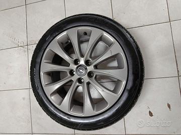 Gomme con cerchi in lega opel