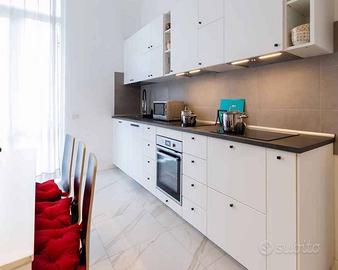 Stanza in appartamento di 202 m² a Milano
