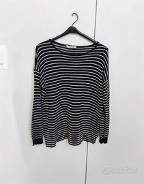 Maglione a righe con vestibilità morbida e ampia.