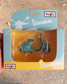Vespa piaggio MP5 Paperino scala 1:18 in metallo