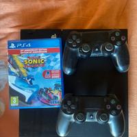 playstation 4 con due controller originali e gioco