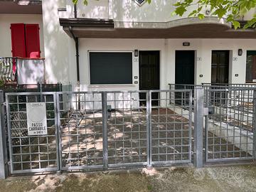 Bilocale con giardinetto recintato e posto auto