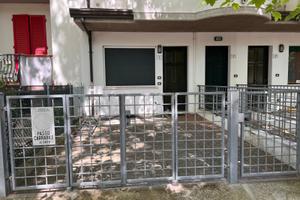 Bilocale con giardinetto recintato e posto auto