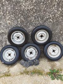 Cinque cerchi completi di mozzi e fuselli fiat 126