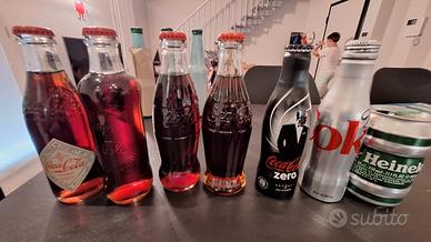 bottiglie e oggetti da collezzione coca-cola