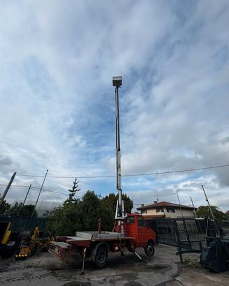 M144 - IVECO DAILY CON PIATTAFORMA CESTA AEREA