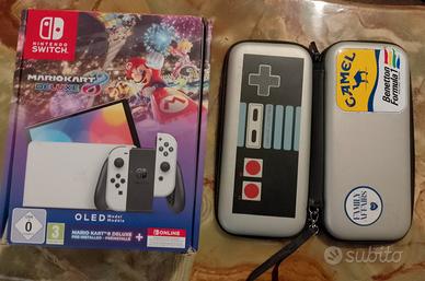 Nintendo Switch Oled mario kart ed. + 3 giochi