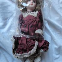 Bambola in ceramica